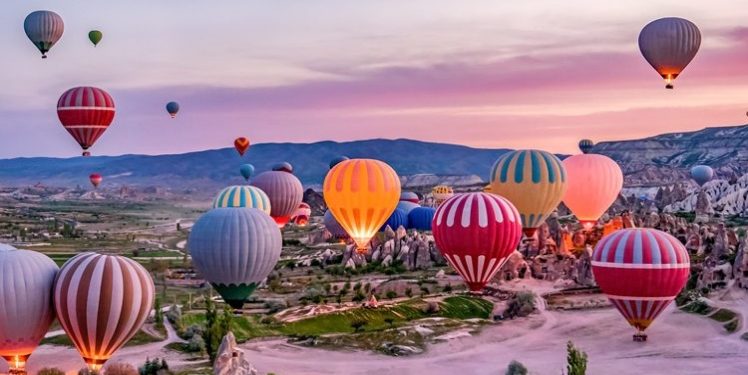 Exploring the Enchanting Landscapes of Cappadocia with Hot Air Balloon Rides